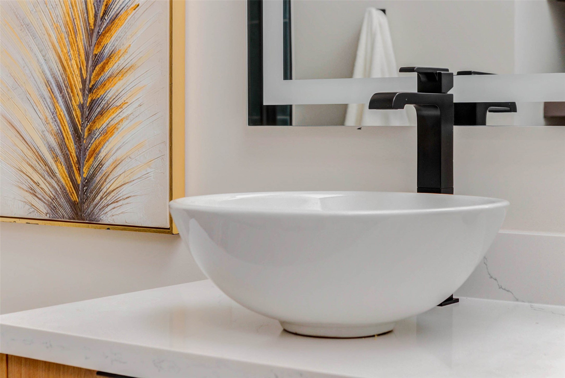 4803 Paula Street Houston, TX 77033 - Photo 19 of 28 The high-end vessel sinks set on a white countertop create a statement piece and add to the luxurious design.