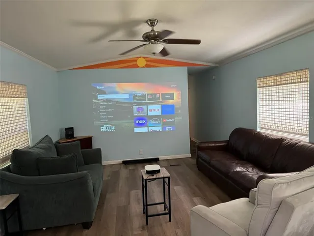 a living room with furniture and a window