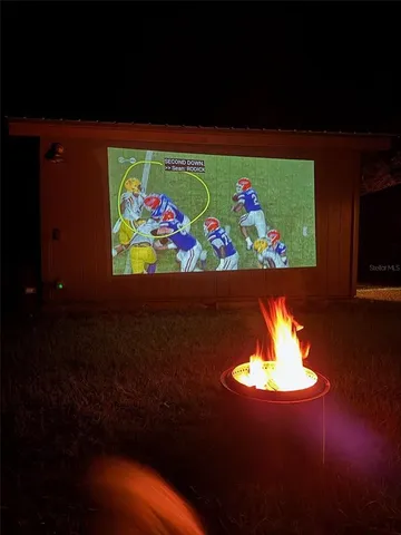 a view of outdoor space with trees all around