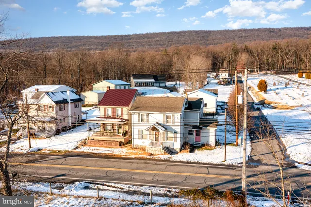 a picture of a bench in front of a window