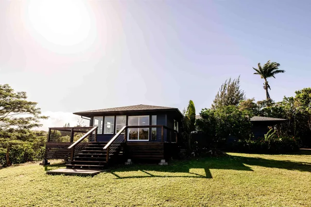 a view of swimming pool with a yard