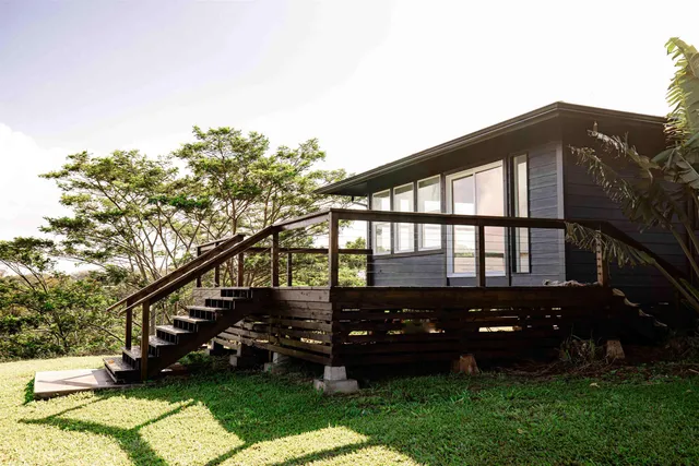 a view of outdoor space with deck and yard