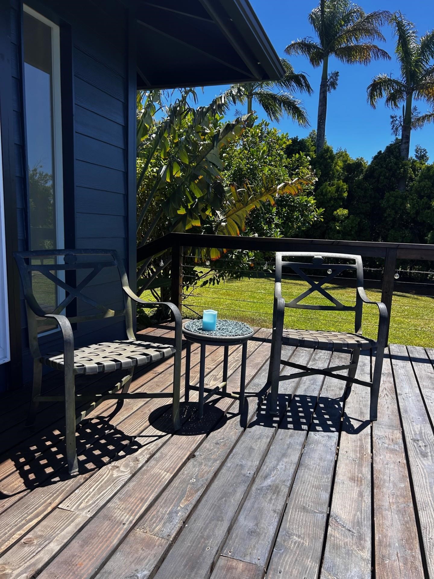 1139 Kauhikoa Road, Unit A Haiku, HI 96708 - Photo 19 of 42 a view of a chairs and table in the balcony
