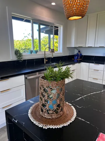 a vase of flowers sitting on a table