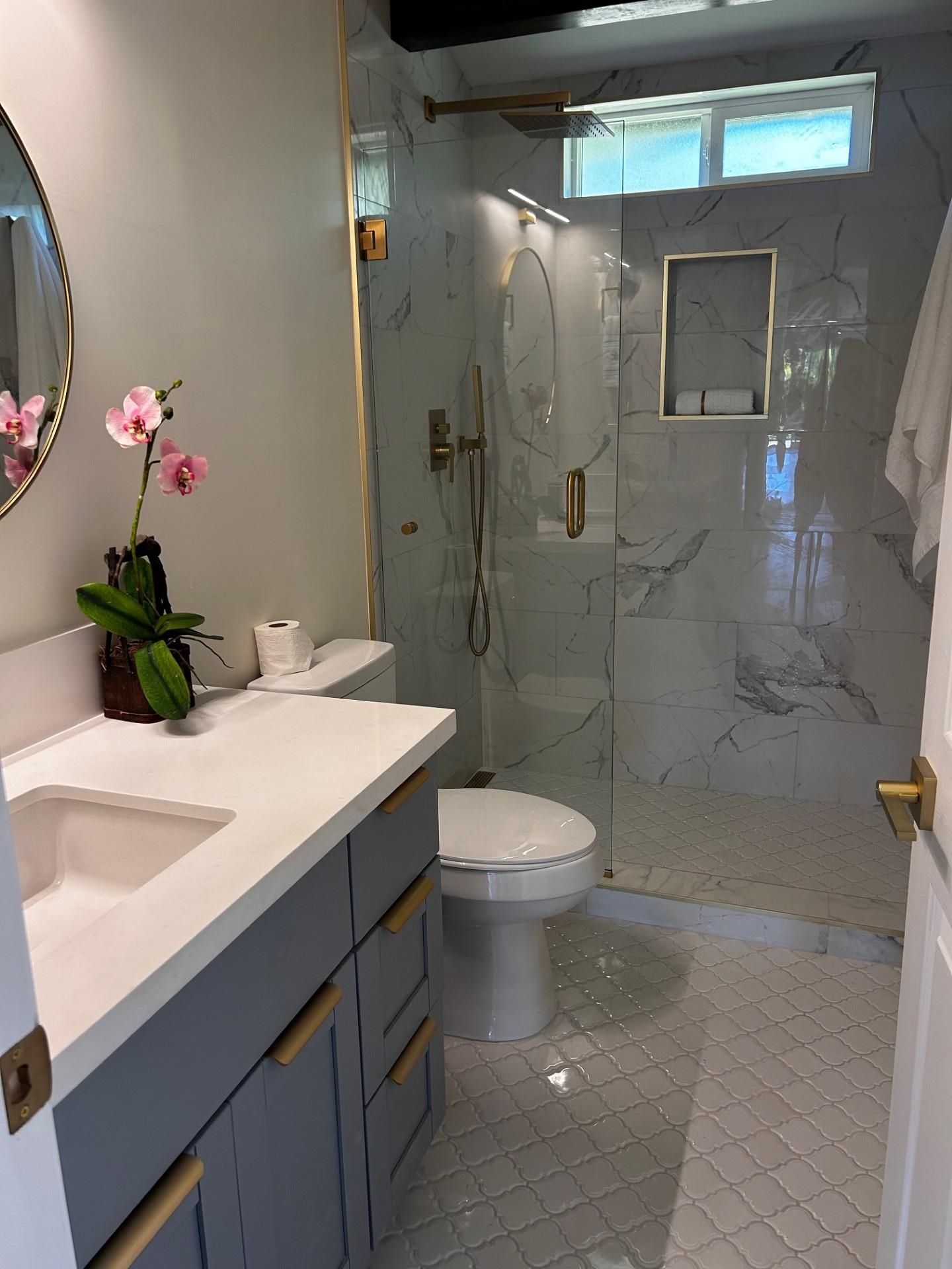 1139 Kauhikoa Road, Unit A Haiku, HI 96708 - Photo 9 of 42 a bathroom with a sink toilet and shower