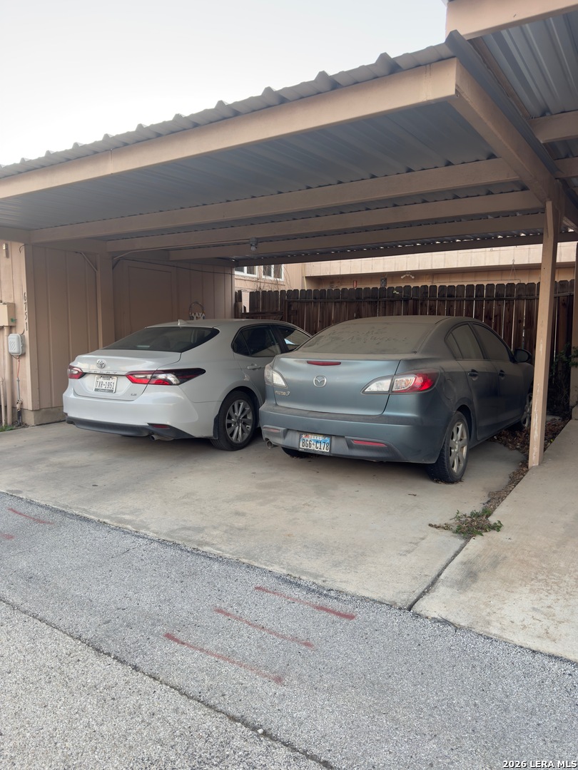6751 Crown Ridge San Antonio, TX 78239 - Photo 2 of 4 a car parked in garage