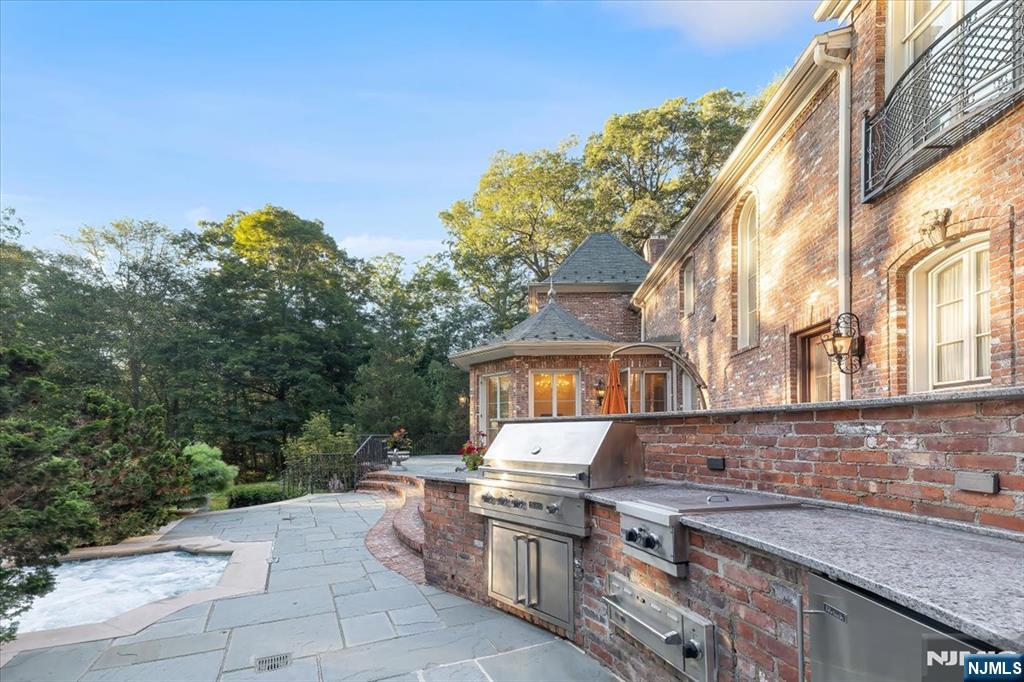 47 Fox Hedge Road Saddle River, NJ 07458 - Photo 18 of 22 a view of a kitchen with a sink and cabinets