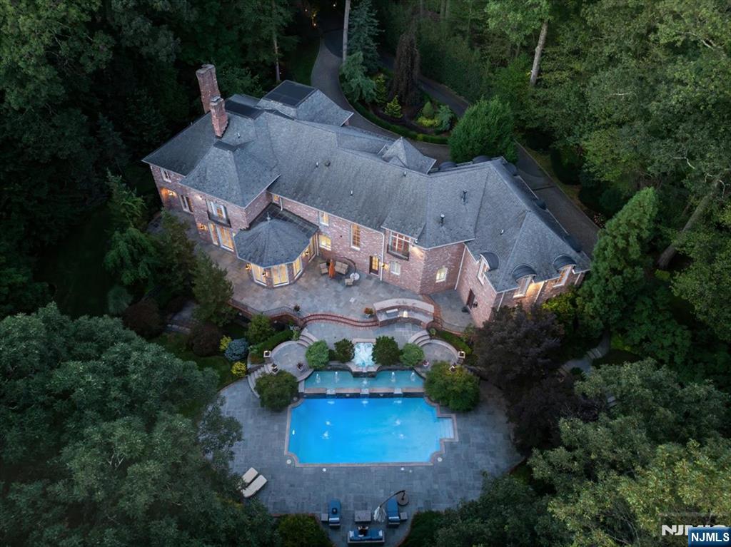 47 Fox Hedge Road Saddle River, NJ 07458 - Photo 22 of 22 an aerial view of a house with garden space and a street view