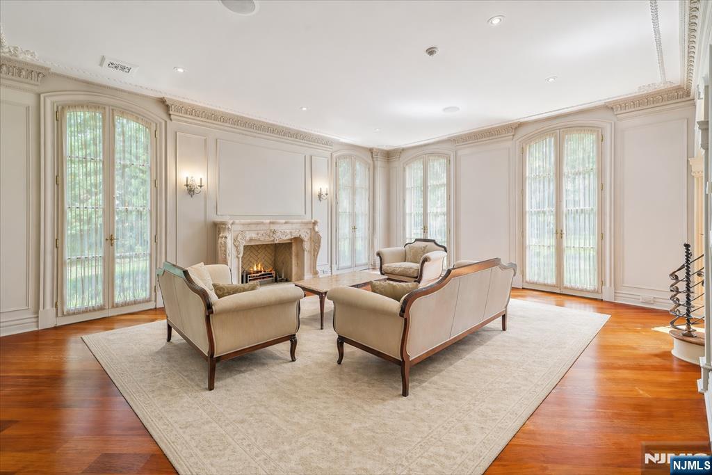 47 Fox Hedge Road Saddle River, NJ 07458 - Photo 6 of 24 a living room with furniture and a fireplace