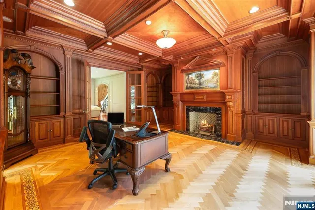 a view of a livingroom with fireplace and furniture