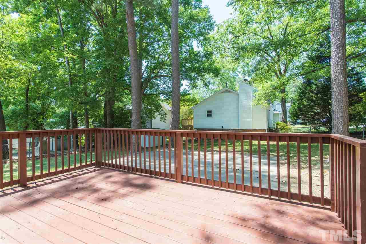 508 Cooper Road Raleigh, NC 27610 - Photo 22 of 25 a view of a wooden fence