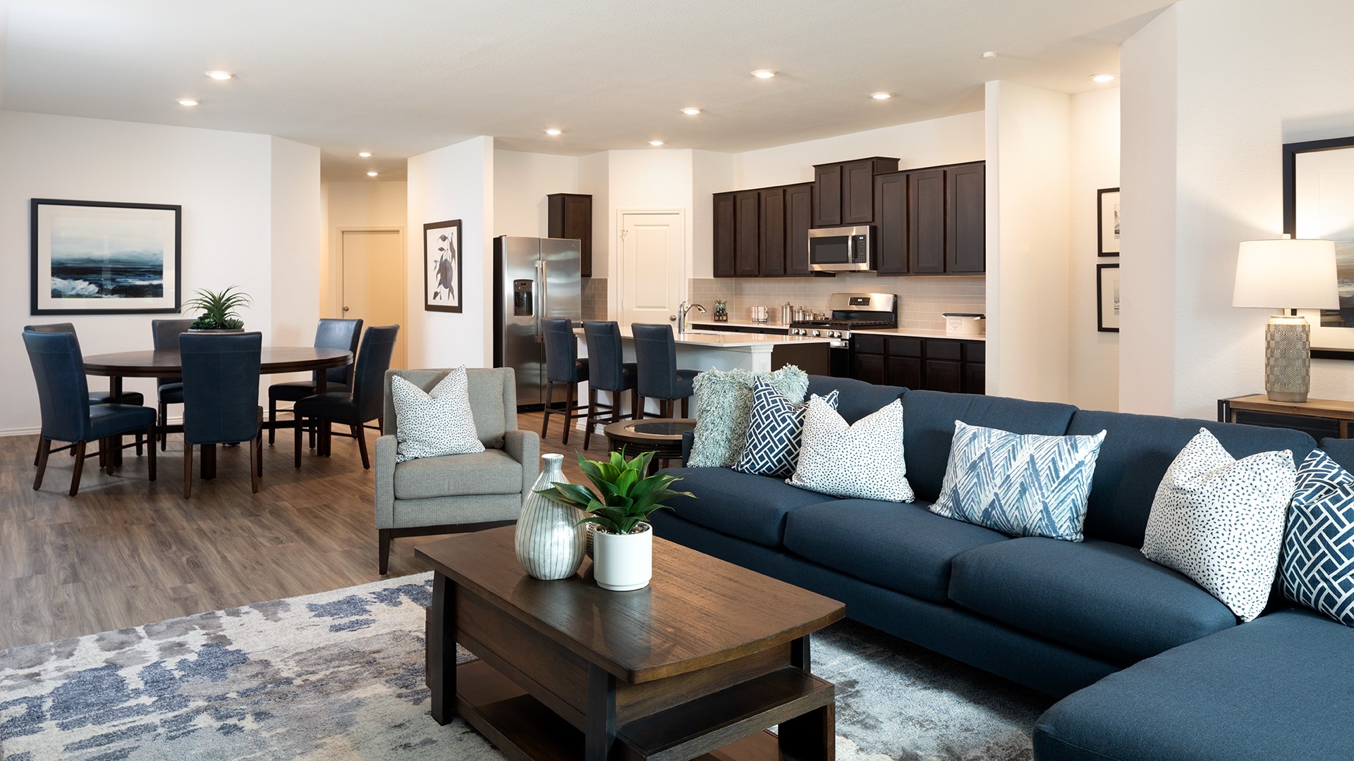483 Sormonne Loop Kyle, TX 78640 - Photo 10 of 14 a living room with furniture kitchen and a view of kitchen