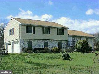 325 Topper Road Fairfield, PA 17320 - Photo 1 of 1 a front view of a house with a yard
