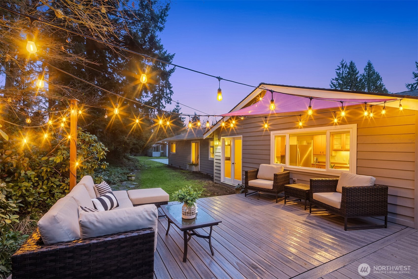 19814 10th Drive Southeast Bothell, WA 98012 - Photo 2 of 40 a backyard of a house with outdoor seating