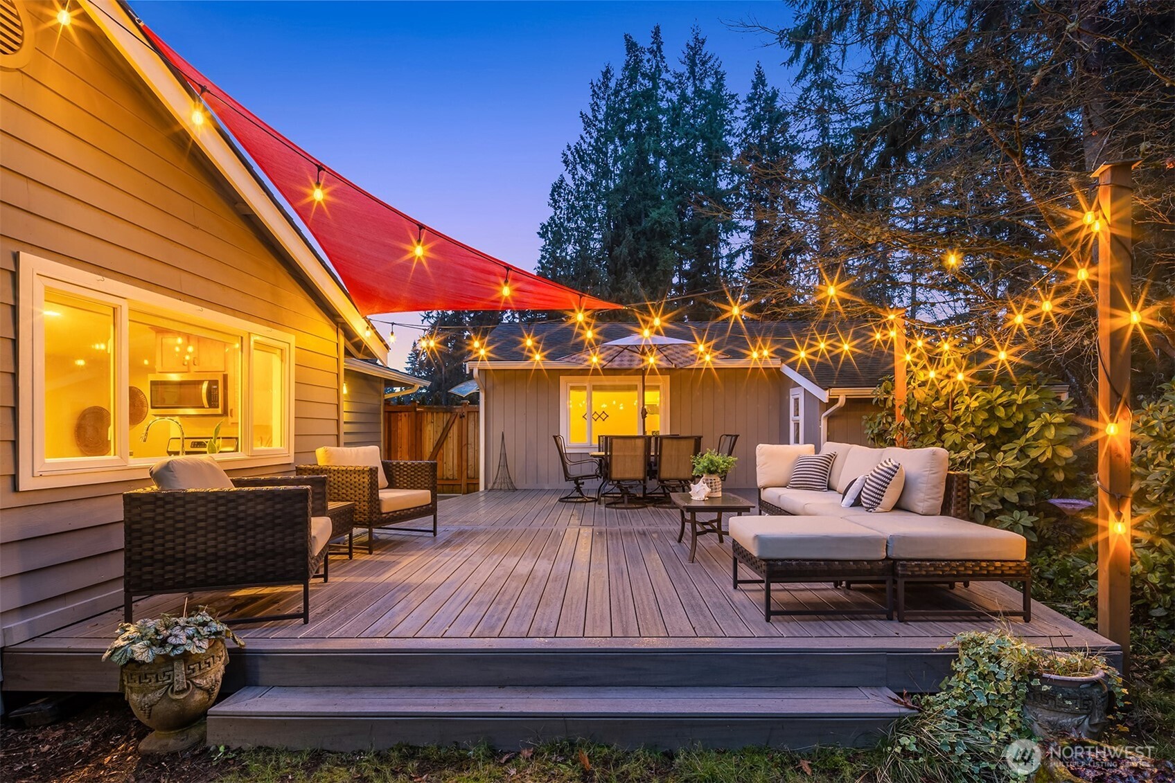 19814 10th Drive Southeast Bothell, WA 98012 - Photo 35 of 40 a patio with patio a couch and chairs