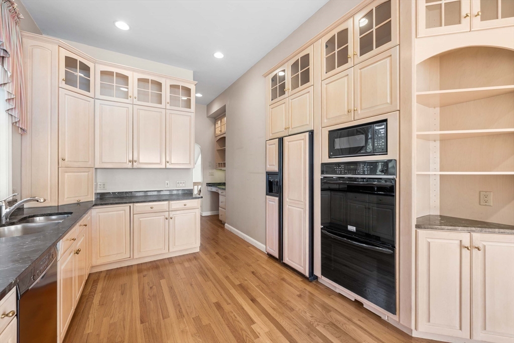 2 Foster Street Marblehead, MA 01945 - Photo 12 of 42 a kitchen with granite countertop a refrigerator sink and stove