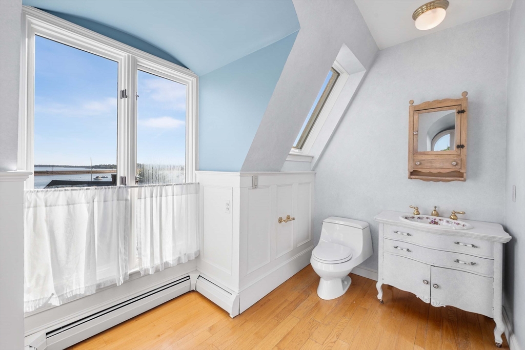 2 Foster Street Marblehead, MA 01945 - Photo 18 of 42 a bathroom with a toilet sink and a shower