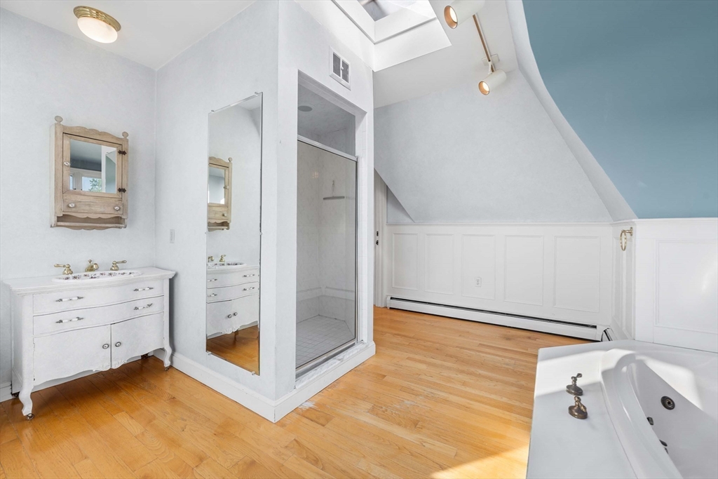 2 Foster Street Marblehead, MA 01945 - Photo 19 of 42 a view of livingroom with hallway and cabinet