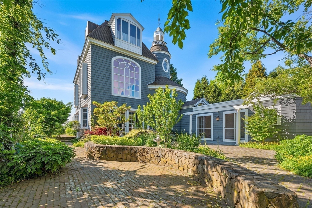 2 Foster Street Marblehead, MA 01945 - Photo 27 of 42 front view of a house with a small yard