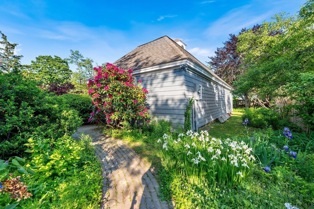 2 Foster Street Marblehead, MA 01945 - Photo 35 of 42 a front view of a house with a yard