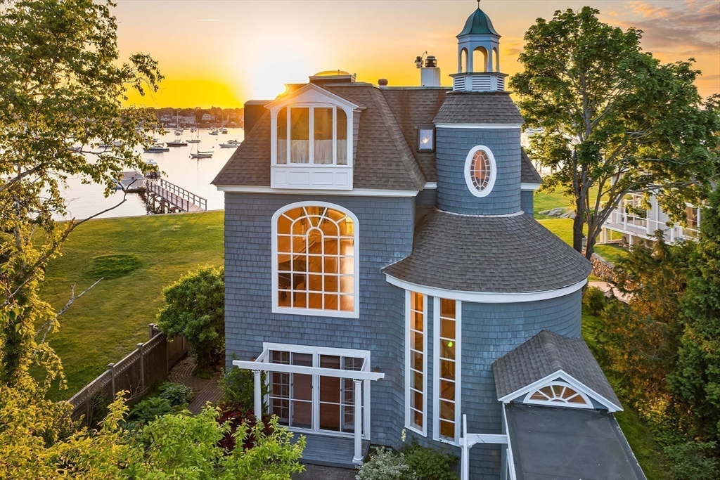 2 Foster Street Marblehead, MA 01945 - Photo 5 of 42 a front view of a house with a yard