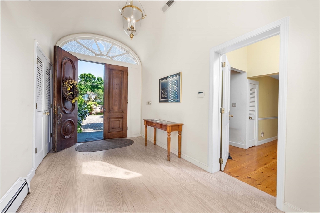 2 Foster Street Marblehead, MA 01945 - Photo 7 of 42 a view of livingroom with furniture and a window