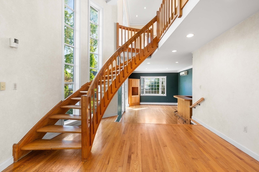 2 Foster Street Marblehead, MA 01945 - Photo 9 of 42 a view of an entryway with wooden floor