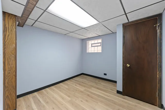 a view of empty room with windows