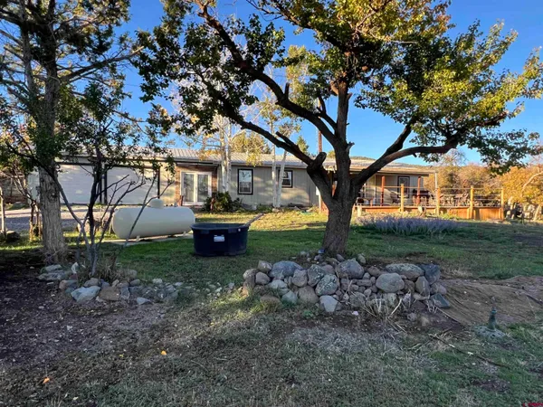 a house view with a garden space