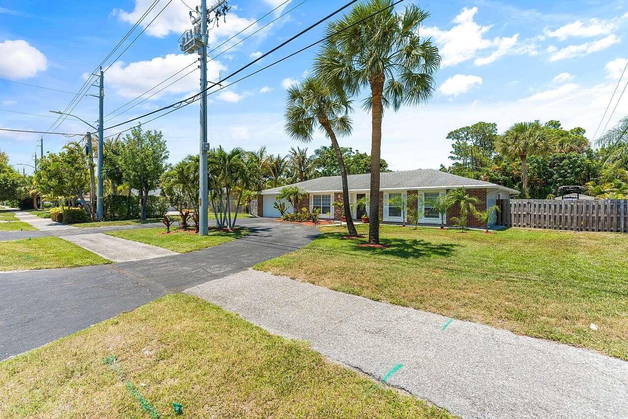 5103 Center Street Jupiter, FL 33458 - Photo 1 of 24 Mulligan.1