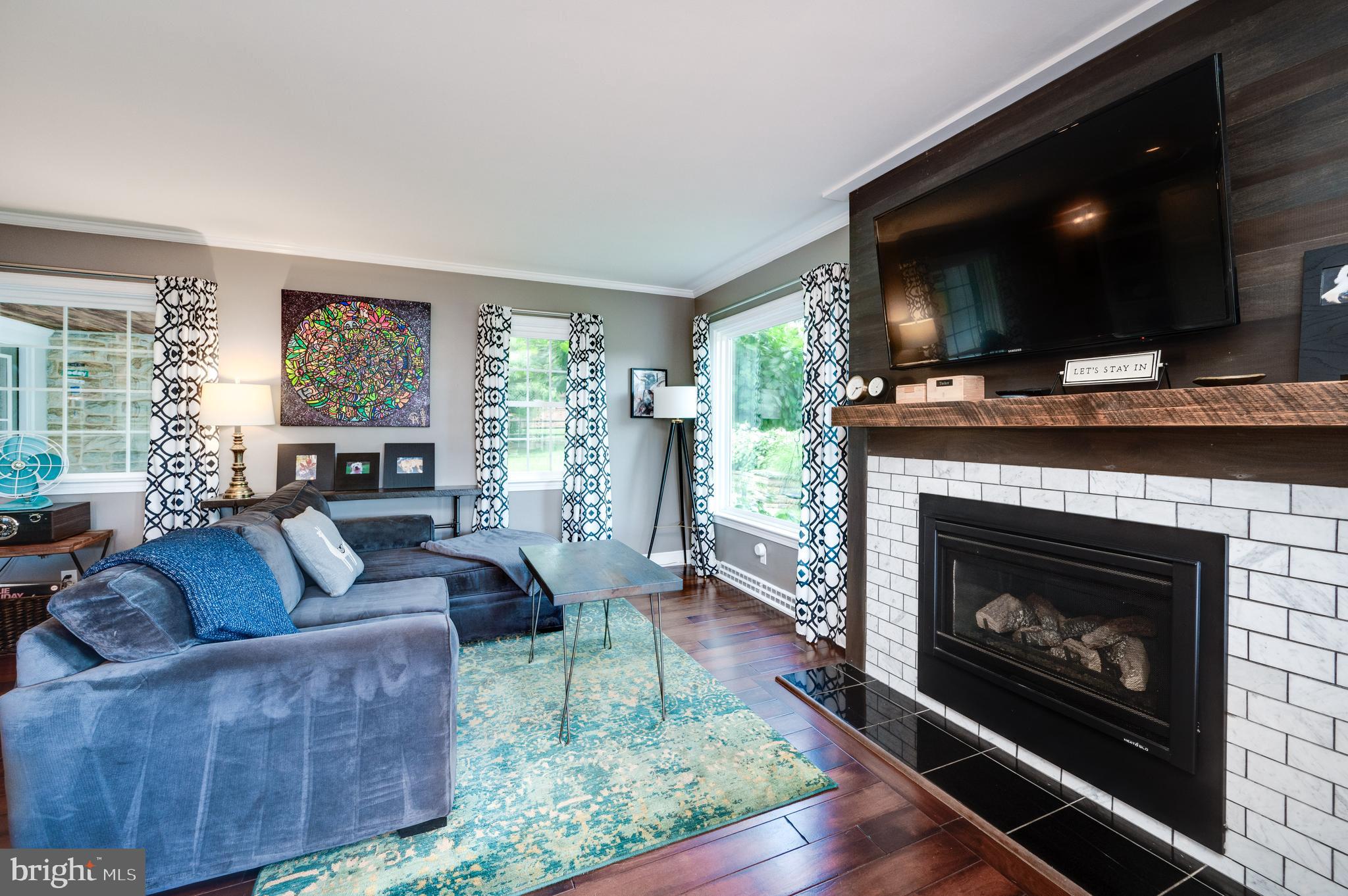 1703 Golf Road Reading, PA 19601 - Photo 24 of 70 Gas fireplace with stained poplar cladding