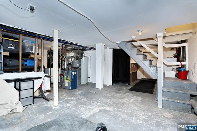 a view of a hallway with seating space