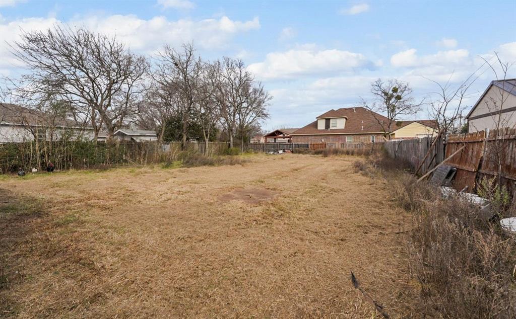 4920 Peachtree Road Balch Springs, TX 75180 - Photo 7 of 7 a view of a yard with a fountain