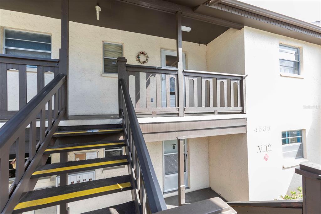 4533 Marine Parkway, Unit 206 New Port Richey, FL 34652 - Photo 3 of 22 a view of entryway with a front door