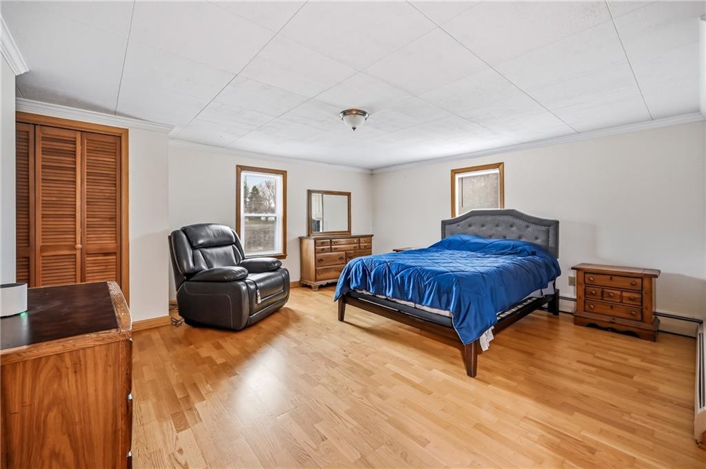 6238 Huron Street Transfer, PA 16154 - Photo 18 of 48 a bedroom with a bed and a couch