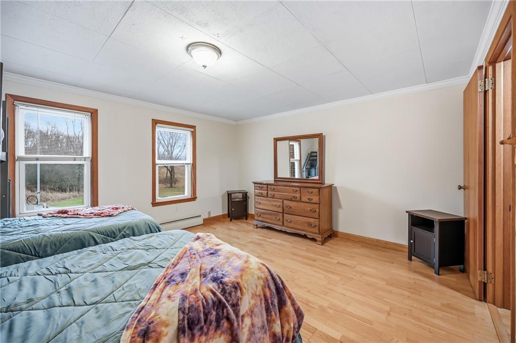 6238 Huron Street Transfer, PA 16154 - Photo 24 of 48 a bedroom with a bed and a window