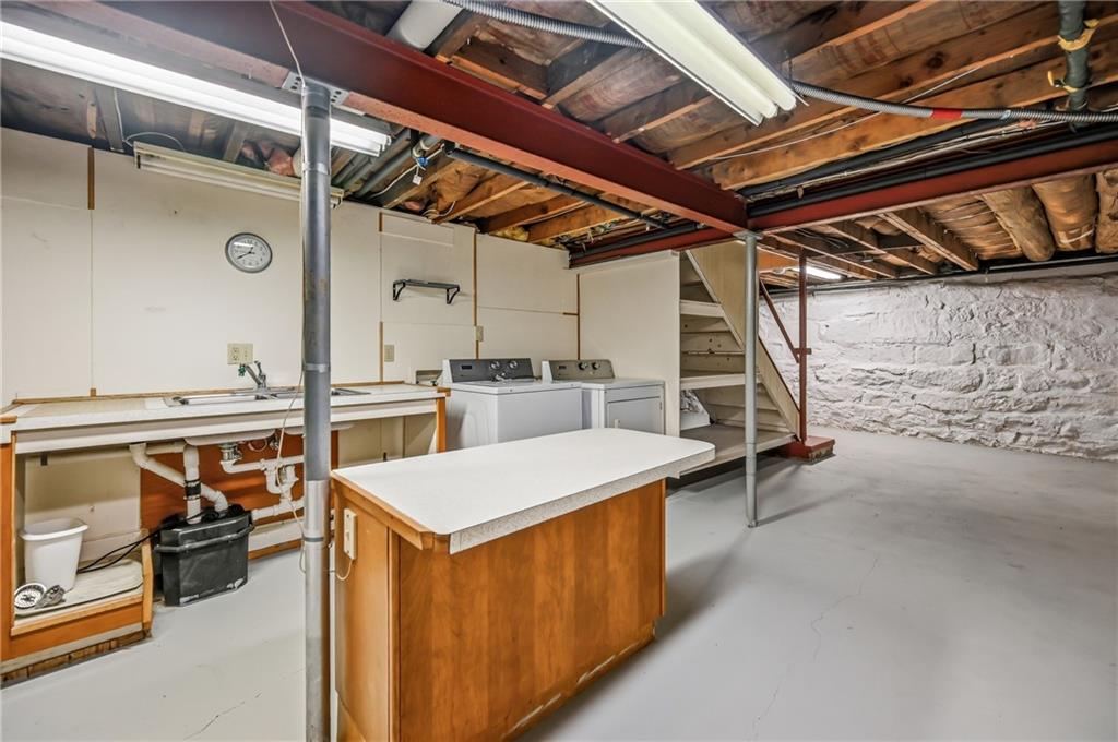6238 Huron Street Transfer, PA 16154 - Photo 30 of 48 a utility room with a wooden floor