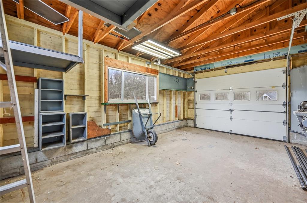 6238 Huron Street Transfer, PA 16154 - Photo 35 of 48 a view of a room with wooden walls and windows