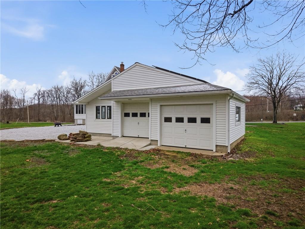 6238 Huron Street Transfer, PA 16154 - Photo 38 of 48 a front view of a house with garden