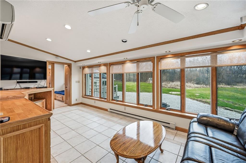 6238 Huron Street Transfer, PA 16154 - Photo 4 of 48 a room with furniture and a large window
