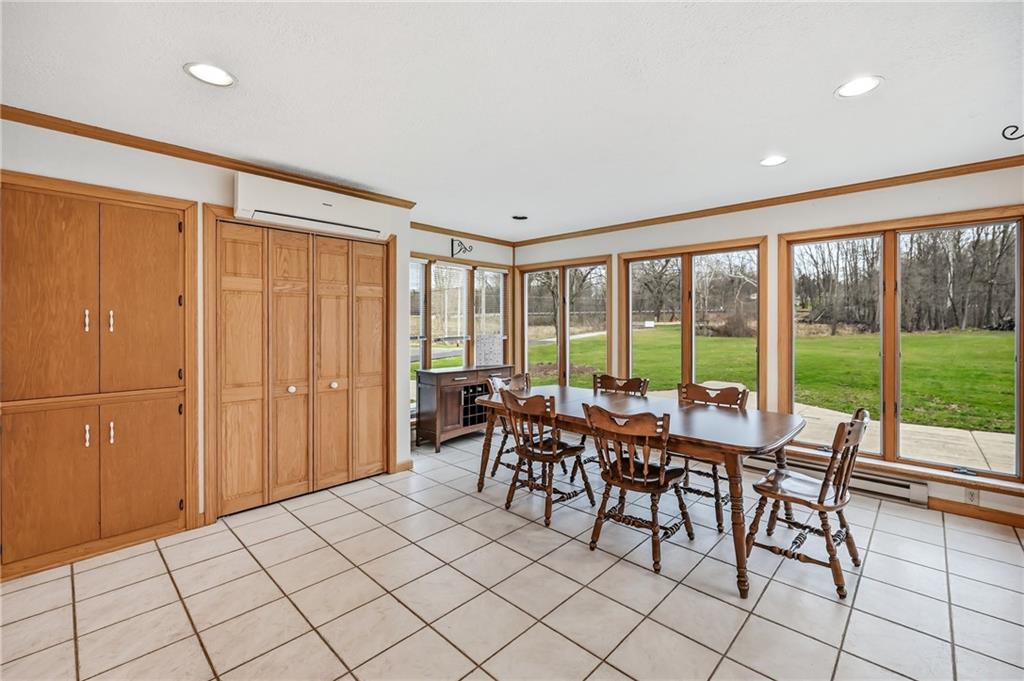 6238 Huron Street Transfer, PA 16154 - Photo 6 of 48 a view of a room with furniture and floor to ceiling window