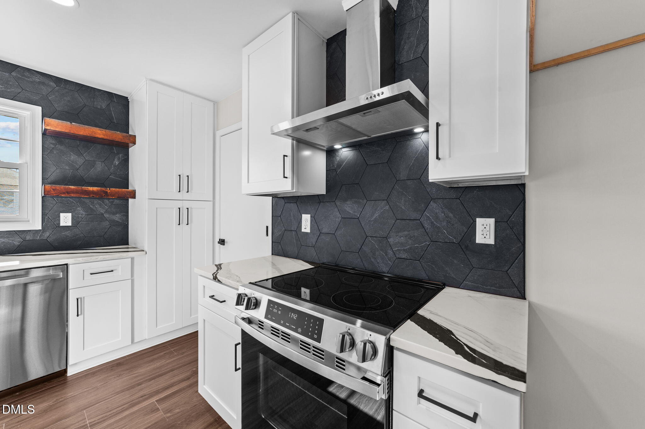 934 Old Zebulon Road Wendell, NC 27591 - Photo 11 of 26 a stove top oven sitting inside of a kitchen