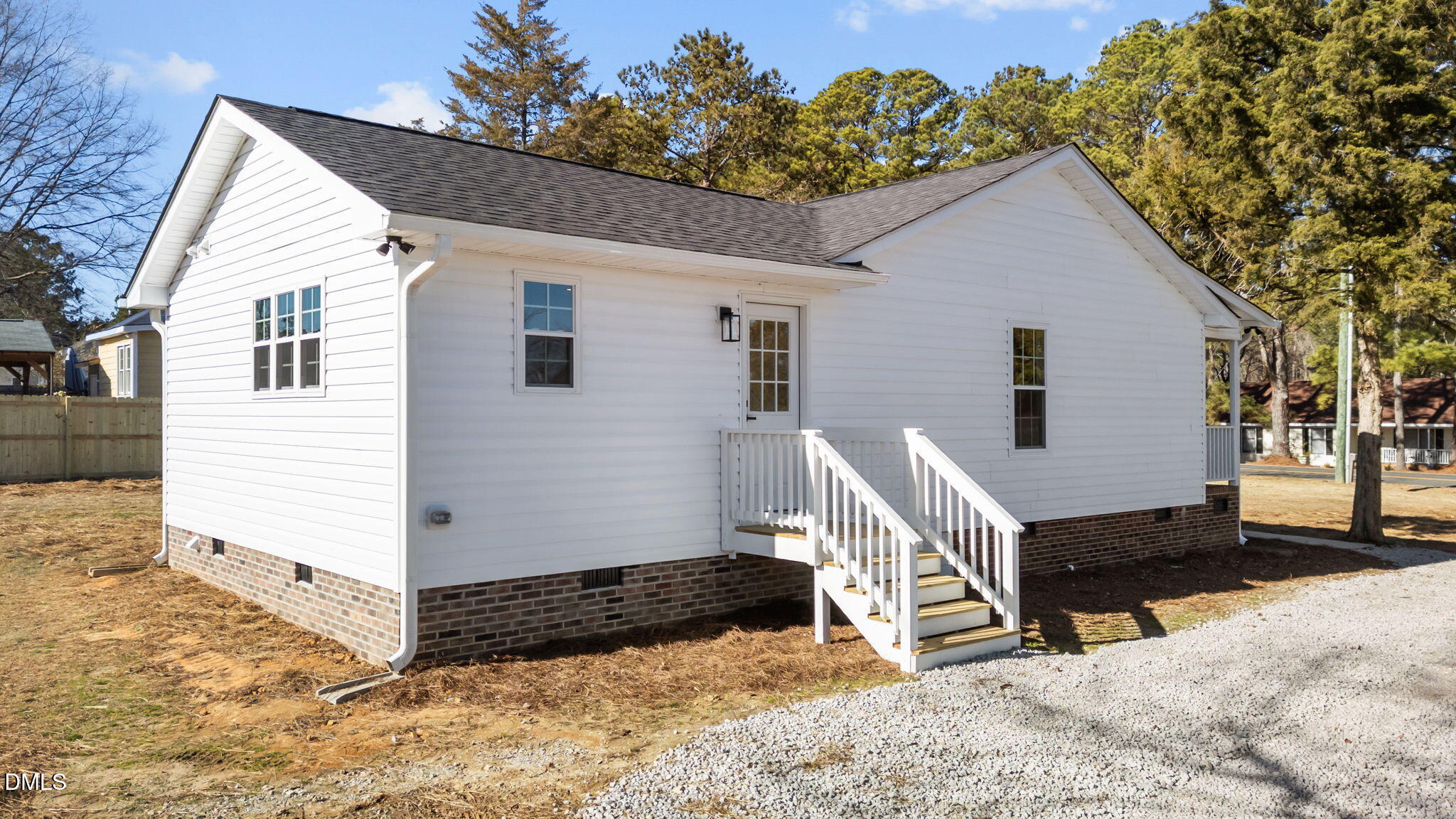 934 Old Zebulon Road Wendell, NC 27591 - Photo 23 of 26 a view of a house with a yard