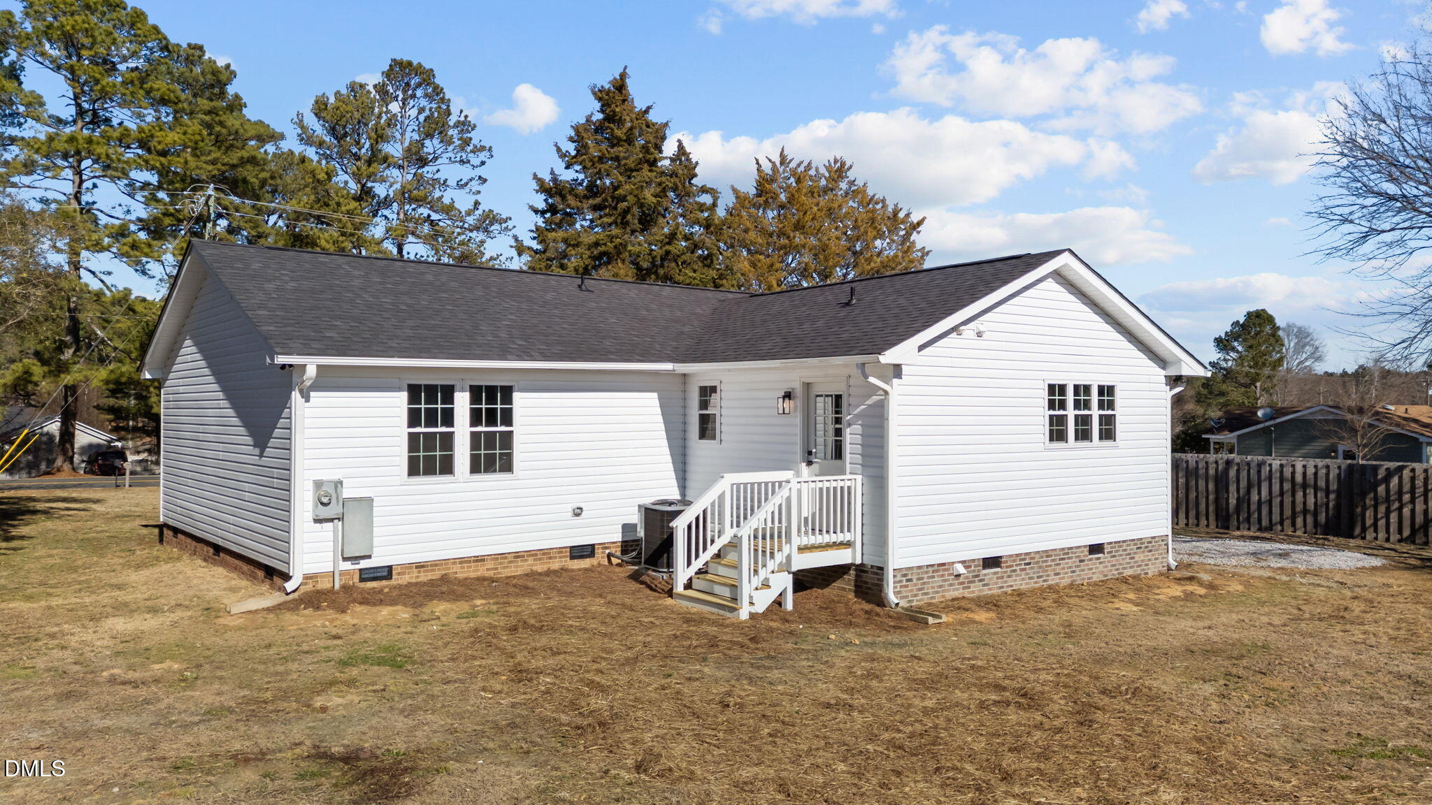 934 Old Zebulon Road Wendell, NC 27591 - Photo 24 of 26 a view of a house with a yard and garage
