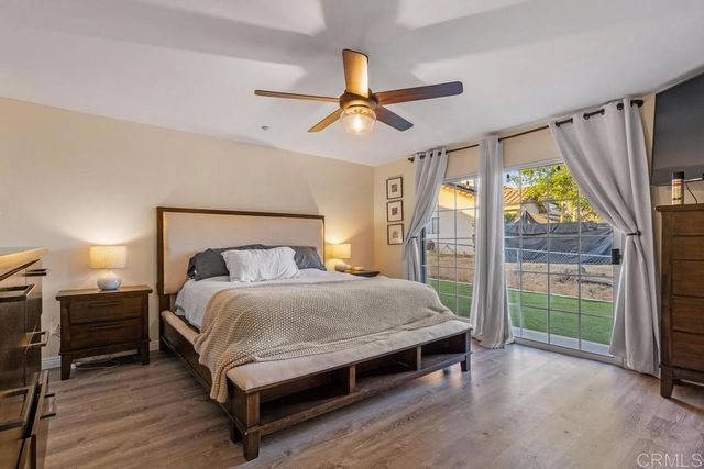 a bedroom with a bed and furniture