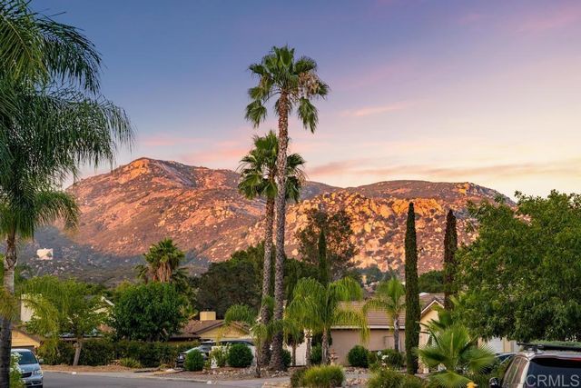 an aerial view of a house with swimming pool