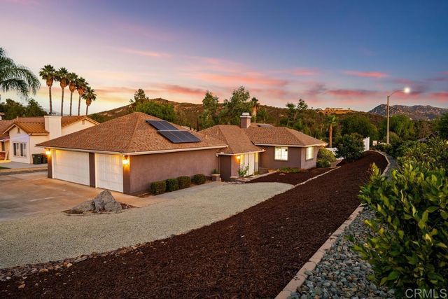 a front view of house with yard