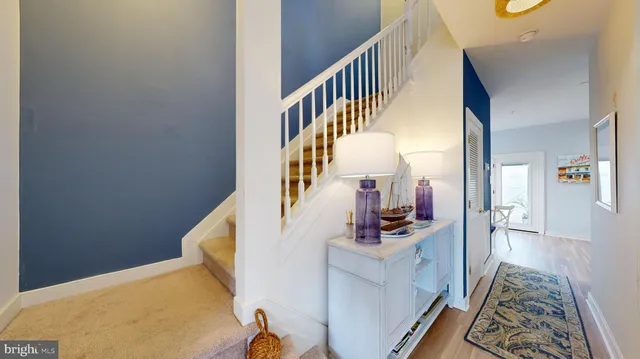 a view of stairs and the main door