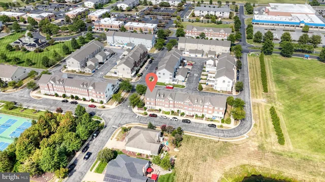 an aerial view of residential building and street