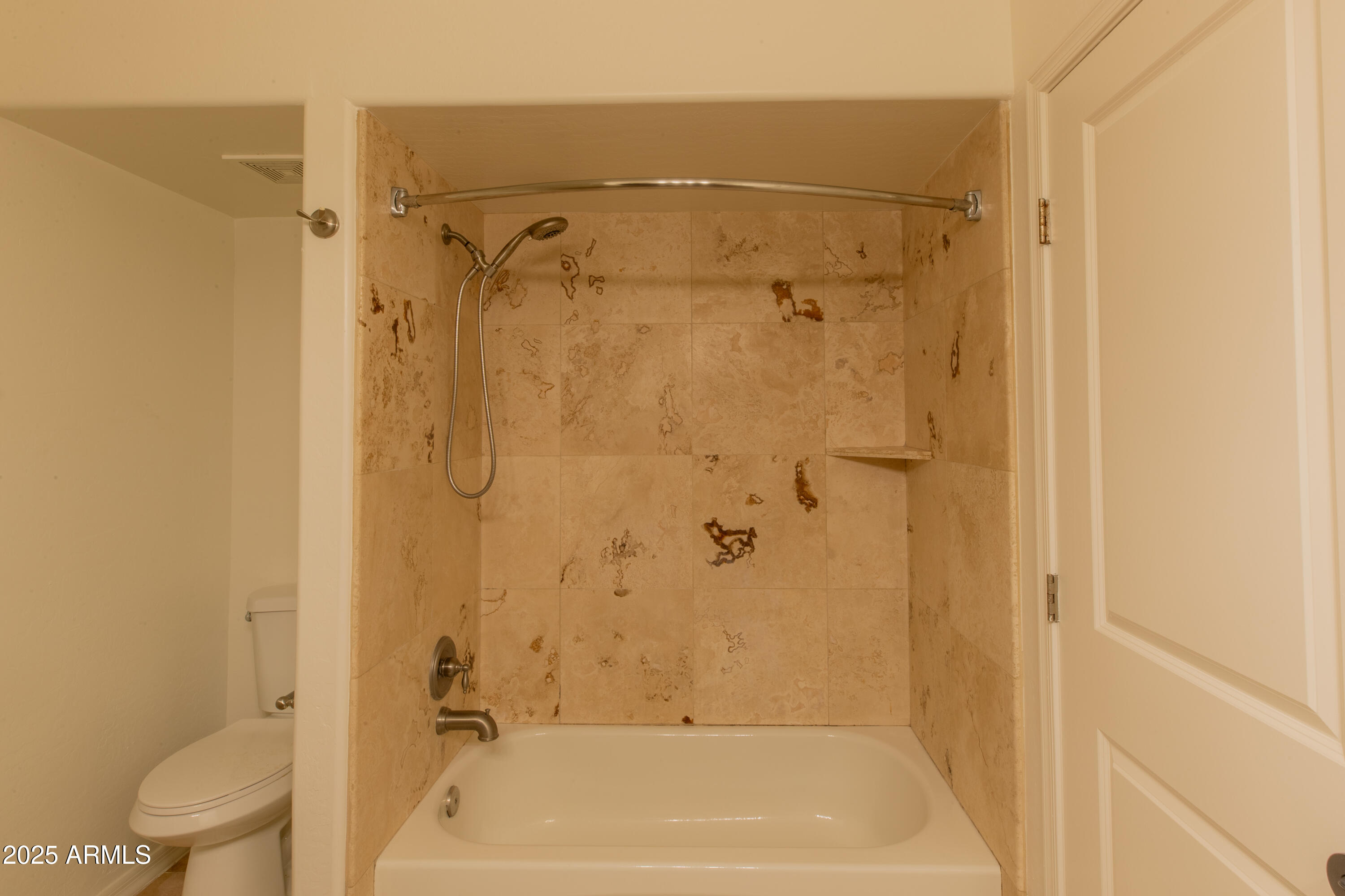 3619 East Monterosa Street, Unit 202 Phoenix, AZ 85018 - Photo 11 of 20 a bathroom with a shower and a toilet